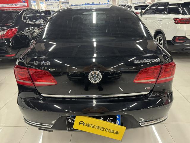 Volkswagen Magotan 2013 модификация 1.8TSI Com f ort – фото 6