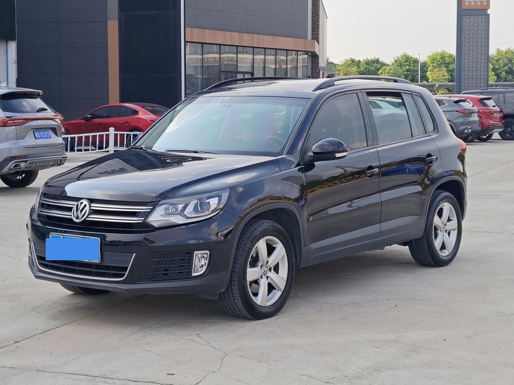 Volkswagen Tiguan 2013 модификация 1.8TSI автоматическое 2WD Comfort Edition – фото 1