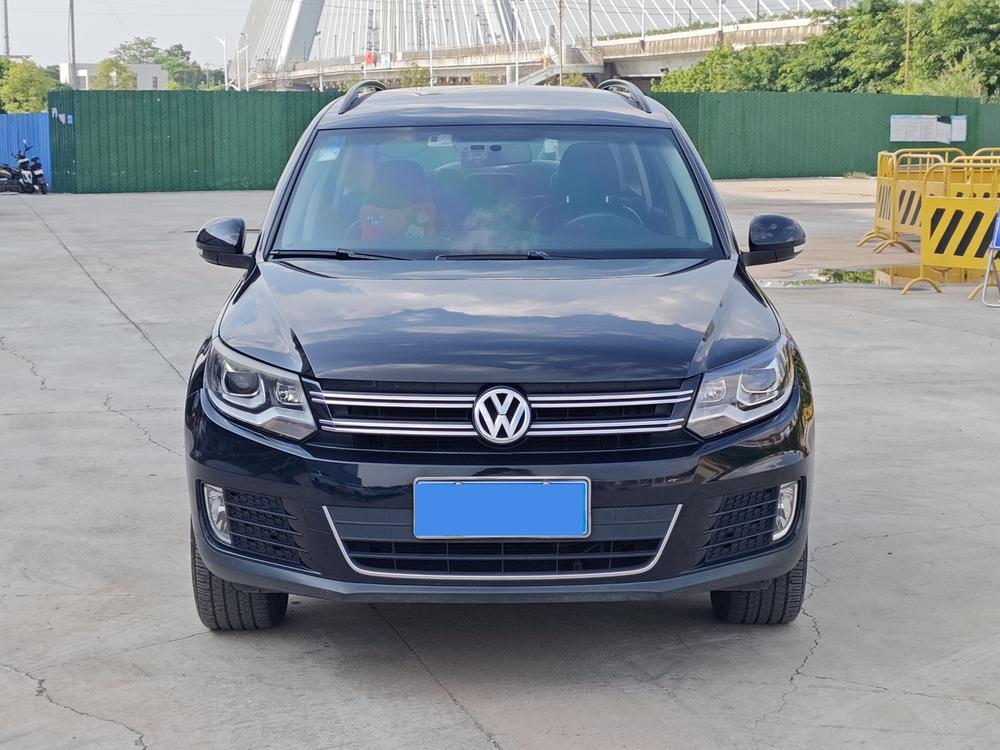Volkswagen Tiguan 2013 модификация 1.8TSI автоматическое 2WD Comfort Edition – фото 2