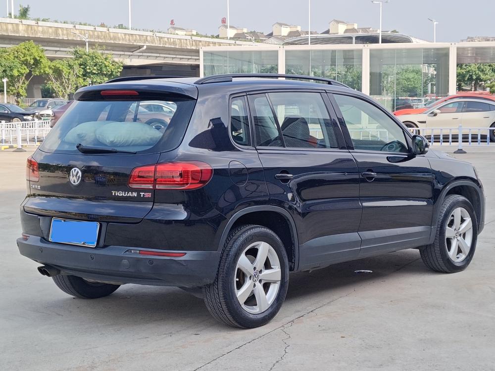 Volkswagen Tiguan 2013 модификация 1.8TSI автоматическое 2WD Comfort Edition – фото 6