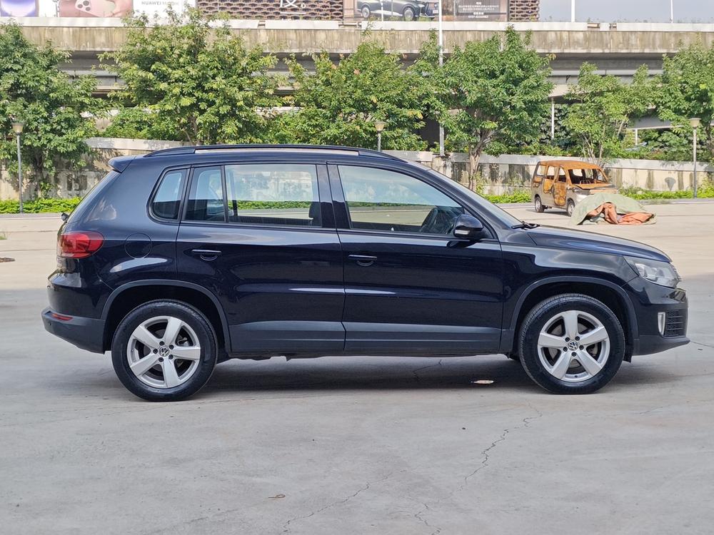 Volkswagen Tiguan 2013 модификация 1.8TSI автоматическое 2WD Comfort Edition – фото 7