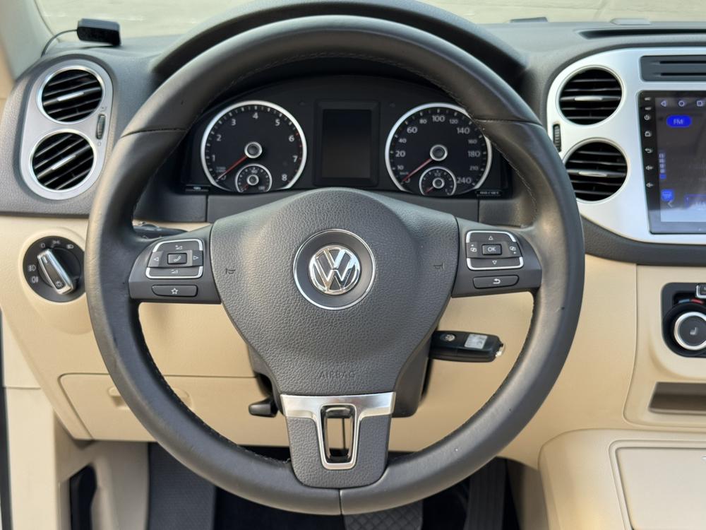 Volkswagen Tiguan 2012 модификация 1.8TSI автоматическое 2WD Elite Edition – фото 11